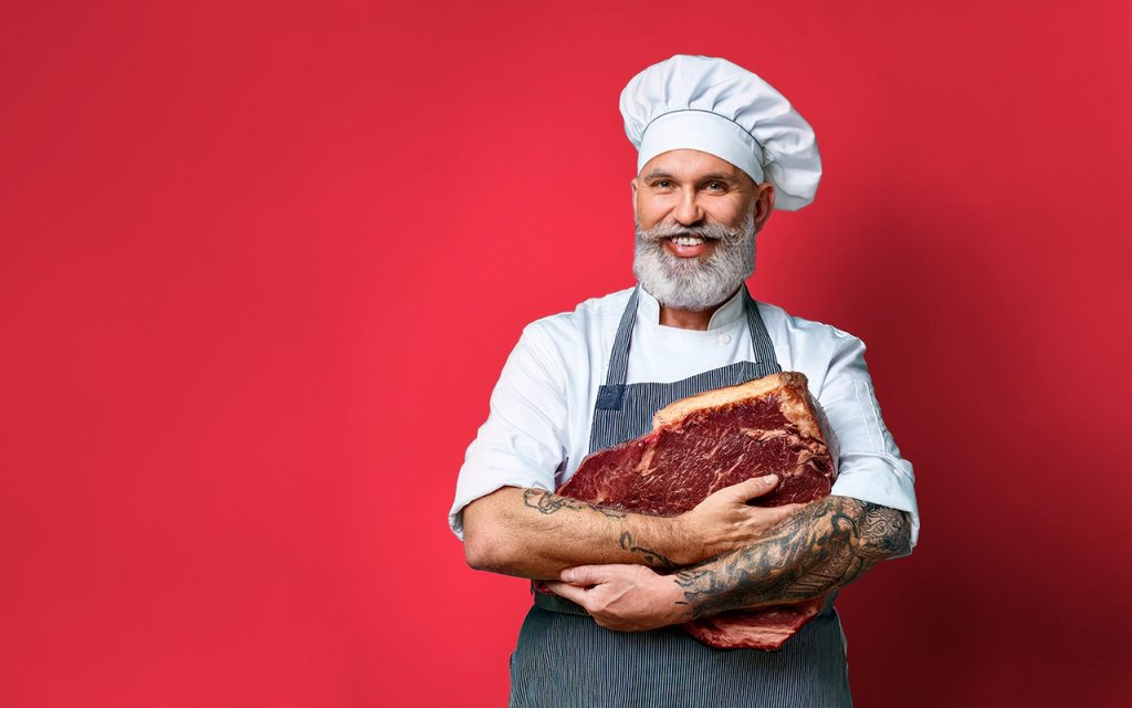 Foodservice Partner PIER 7 - Koch mit T-Bone-Steak