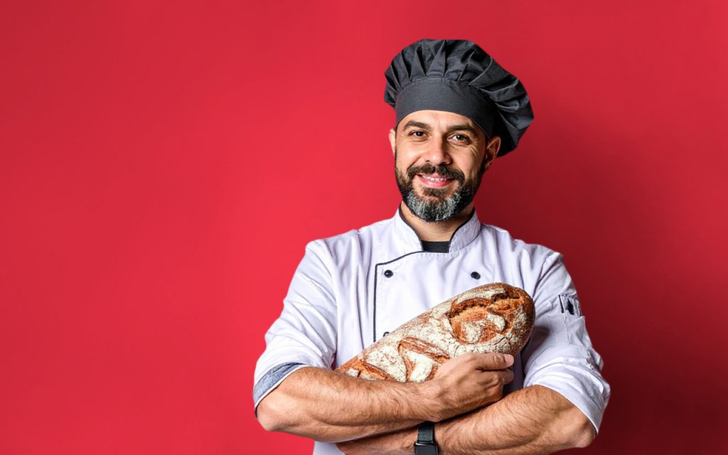 Kontakt PIER 7 – Koch mit Brot